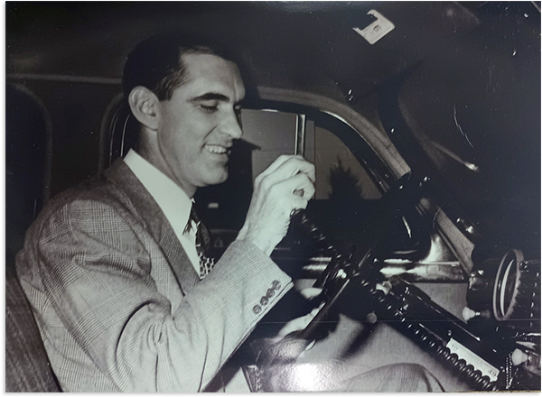 Shirley Briggs operating a two-way radio in one of his cabs.